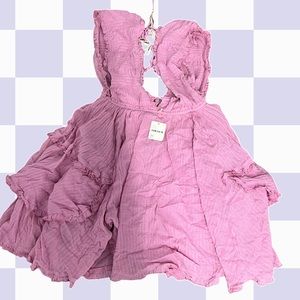 Nwt pink free people Antoinette mini dress with raw hem plunging front and back